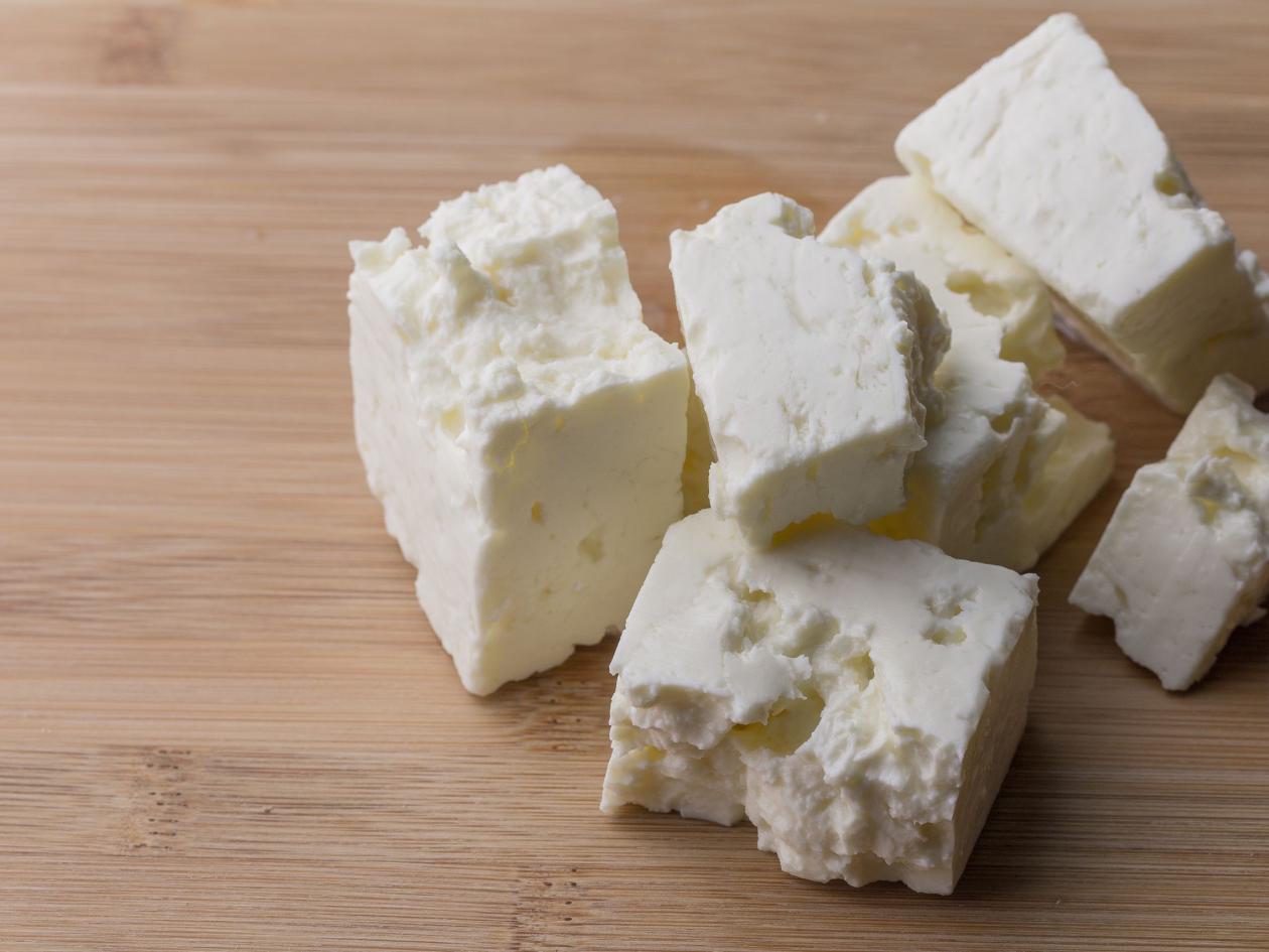 Soft White Cheese Cubes On Wooden Board With Copy Space - Feta Cheese