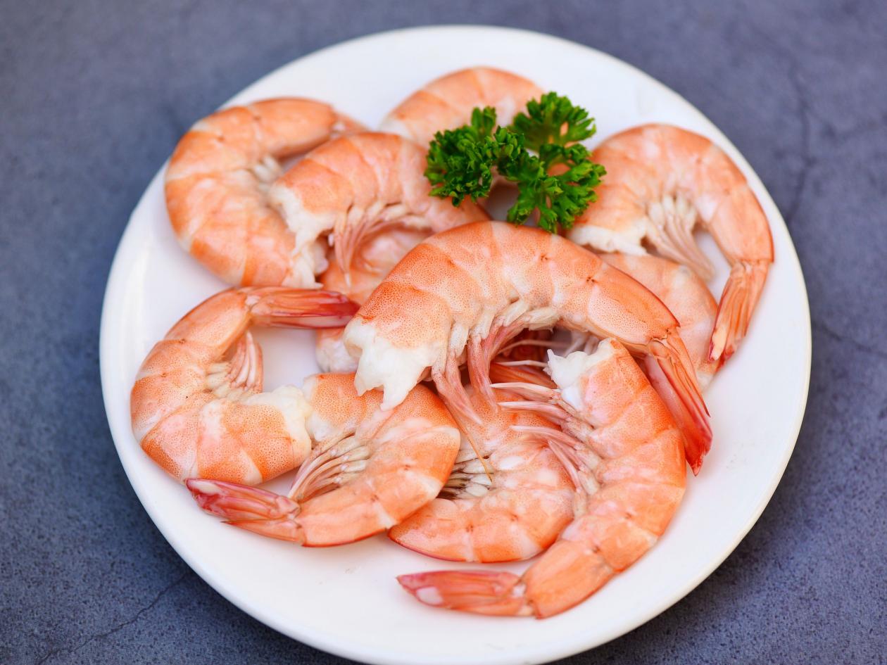 Fresh Shrimps Served On White Plate With Parsley, Boiled Peeled Shrimp Prawns Cooked In The Seafood