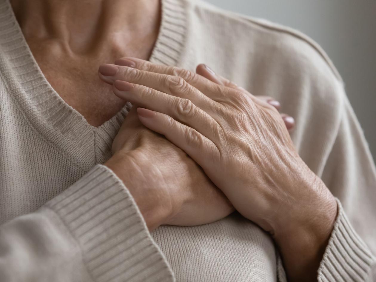 Mature Elderly Woman Feeling Heart Pain, Touching Chest