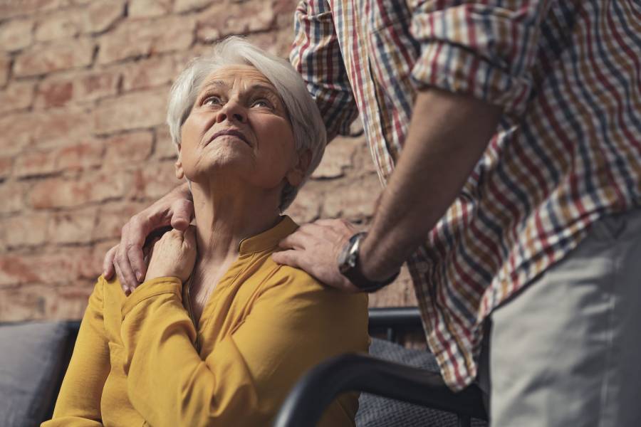 Old Senior Caucasian Woman With Dementia Getting Support And Care. High Quality Photo